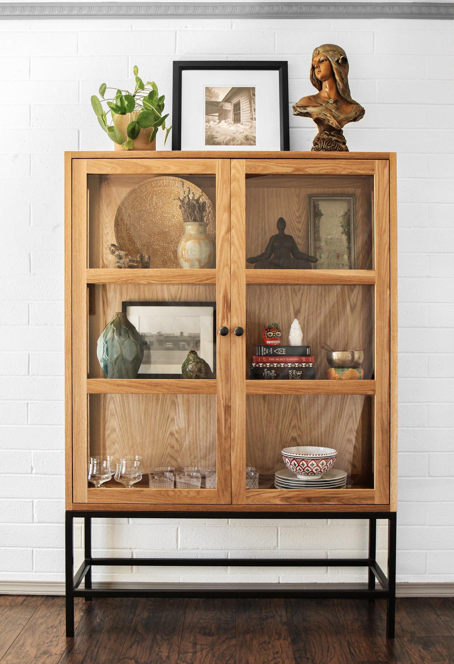 Styled white oak display cabinet.