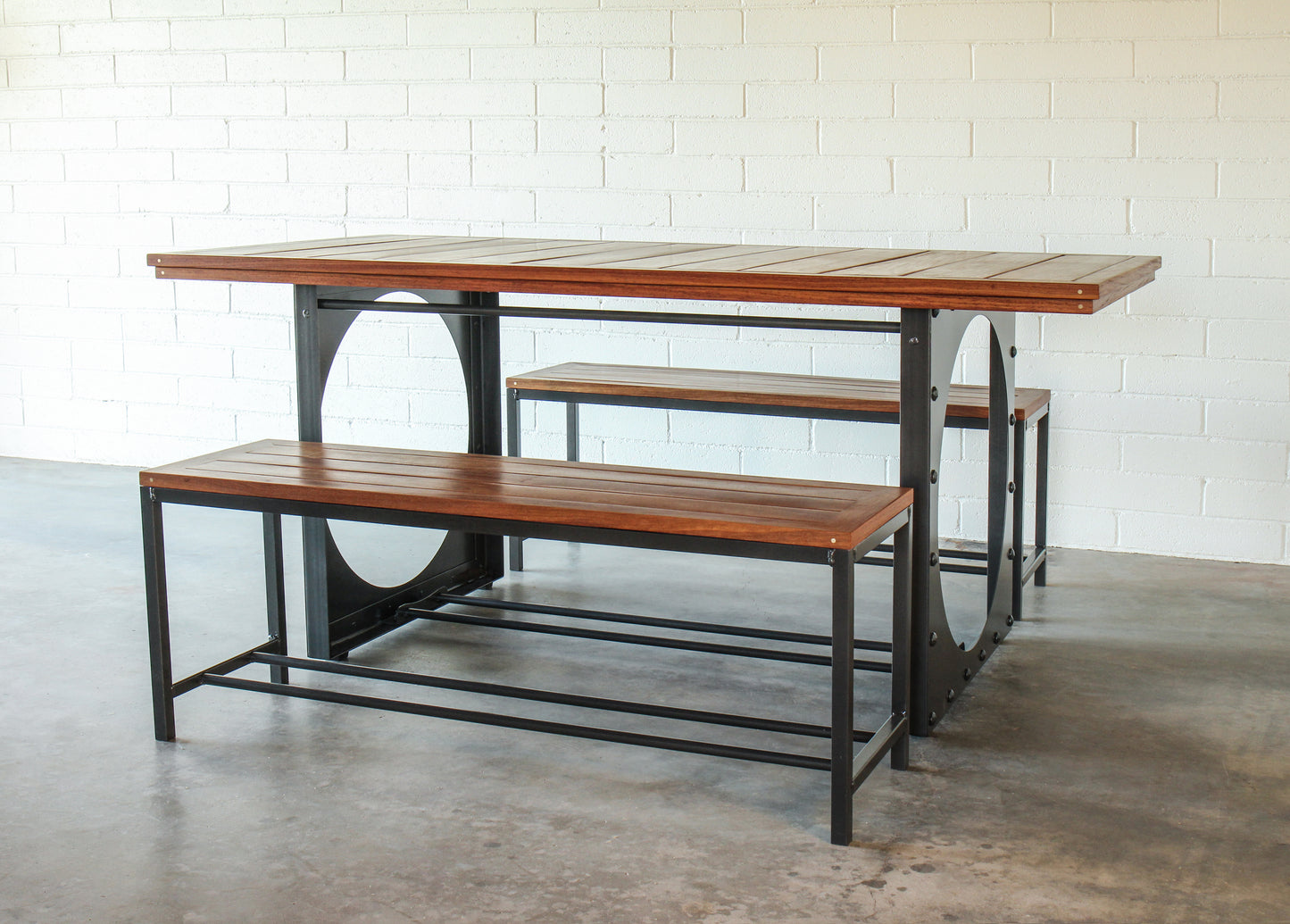 Outdoor dining table set-Table including two benches. Metal base, cumaru top, brass inlays.