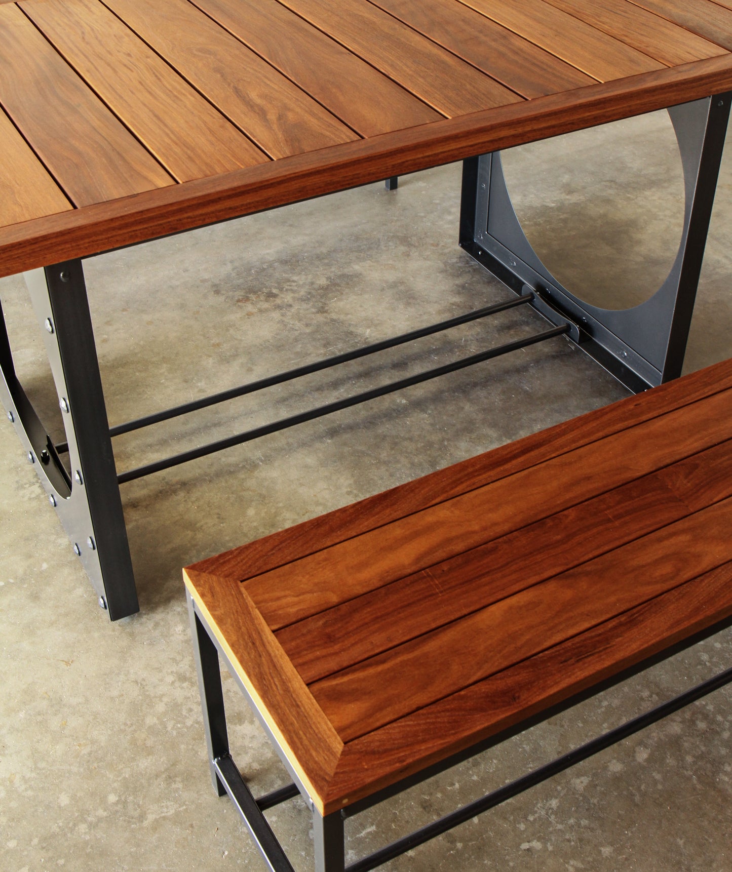 Outdoor dining table set-Table including two benches. Metal base, cumaru top, brass inlays.