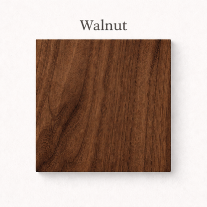 Square piece of walnut wood on a white background with 'Walnut' text above.